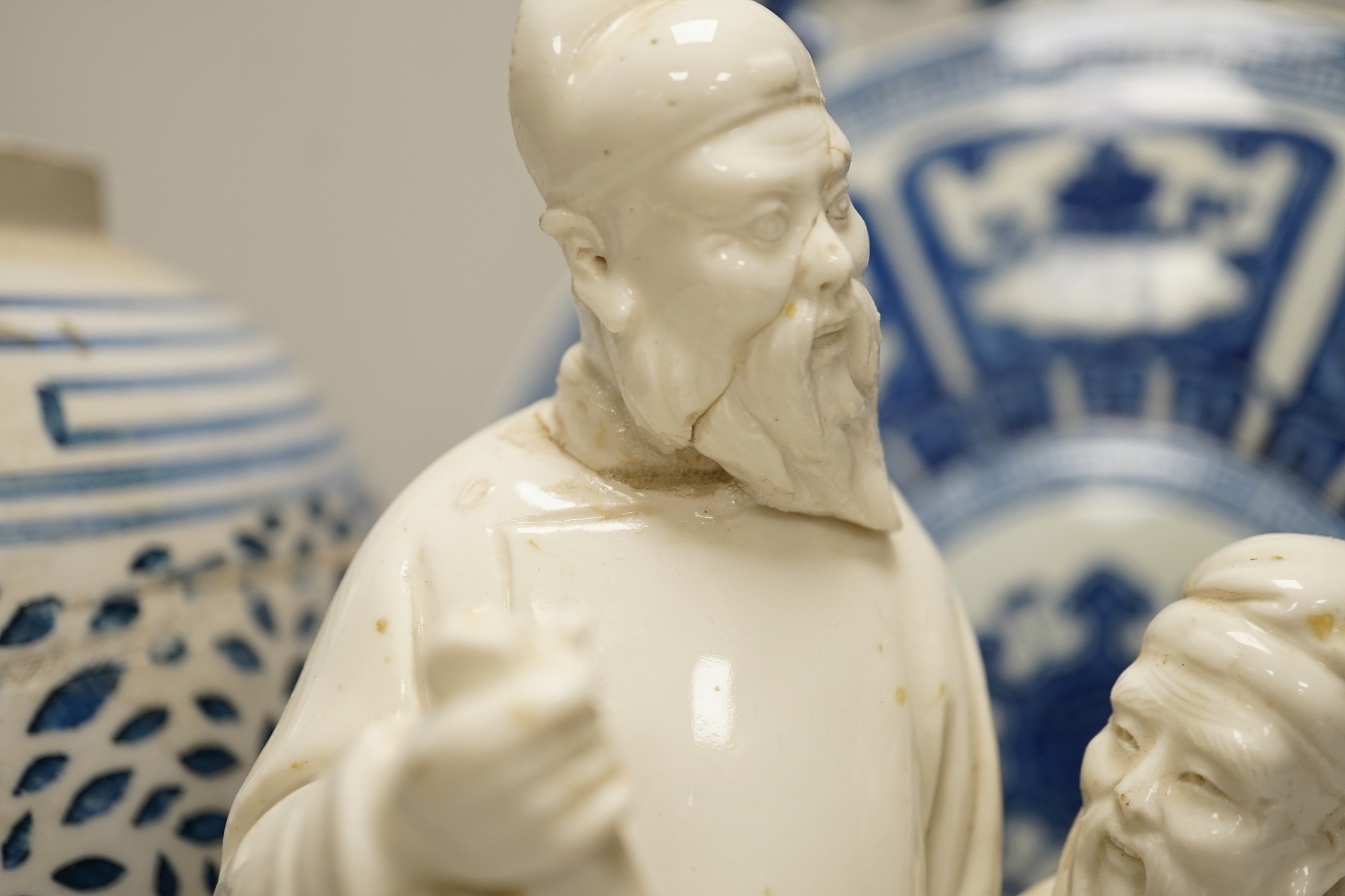 A Chinese blue and white two handled moonflask, together with another Chinese vase and Chinese figure group, tallest 36cm